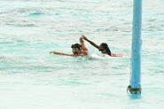 Jonathan helps Maryanne manage the waves in Survivor 42.