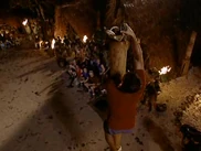 Brady climbing a greasy pole.