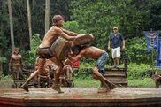 Tyson competes in the Reward Challenge, Sumo in Mud.