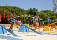 Ashley and Desi competing for Levu in the fifth Reward Challenge, A-Tension Span.