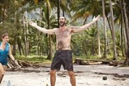Scot reacts with excitement to the merge.