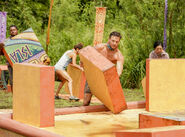 Lairo competes in the seventh Immunity Challenge, Faulty Towers.