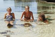 Dawn, Sherri, and Erik relaxing in the lagoon.