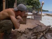 Sean making fire at Rattana camp.