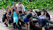 Odette helps bring Asaga's raft ashore at the Race to Shore Reward Challenge.