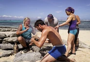 Takali tries to start a fire.