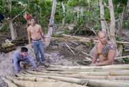 Caleb, Malcolm, and Tony building the shelter.