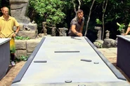 Mike duels in Survivor Shuffle Board.