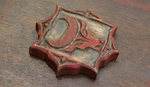 Survivor: Philippines Hidden Immunity Idol, a plaque with the tribe logo.