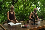 Nicole and Cobus competing for immunity on the Island of Secrets.