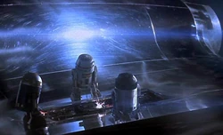 A group of astromech droids attempt to repair the damage on the queen's starship.