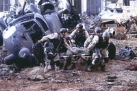 Necasians retrieve some of their wounded