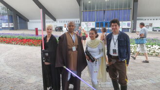 Fans dressed as Sith, Mace Windu, Padme Amidala, and Han Solo.