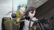 Sinon on the back of a buggy that Kirito is riding.