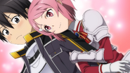 Lisbeth holding onto Kirito's arm