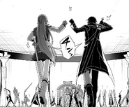 Kirito and Asuna bumping fists after defeating Asterius