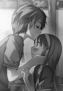 Kirito kissing Selka on the forehead.