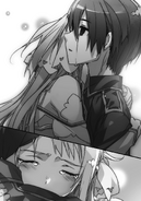 Kirito being tearfully hugged by Asuna.