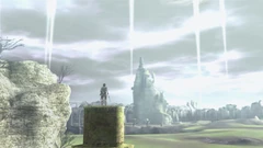 Great beams of light point up to the sky to indicate a place in the  where a colossus has fallen.