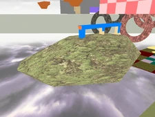 A rock-shaped object with the collision model of one of the ruins from the 14th colossus' arena.