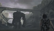 The 15th colossus seen walking through the ancient ruins in which it dwells.
