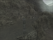 The path leading up to the cave passage to the Ruins in the PSU Preview and E3 Demo versions.