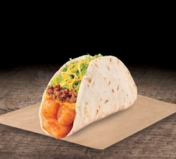 A crispy potato soft beef taco