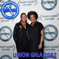 EV&Karyn GalaPhotoWall-sharedassets13.assets-423.png (1.72 MB) A photo of E.V. St. James with her sister Karyn St. James of the CFNMU at the Union Gala 2082, found in a drawer in E.V.'s office.