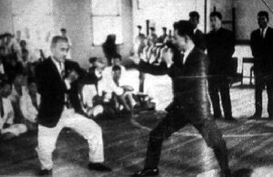 Won Kuk Lee and  face each other at the  dojang in the 1960s