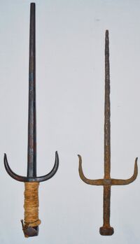 Two antique sai