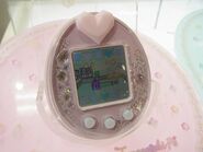 A pink Tamagotchi P's on display