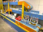 TamagotchiFactory Inside3.jpg (214 KB) Products on a display themed after a conveyor belt