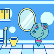 Checking herself out in the mirror