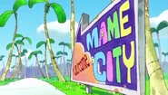 A sign for Mame City