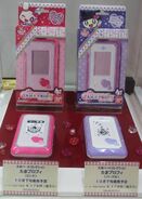 Prototypes of the Tama Profys, shown at the Tamagotchi! EXPO 2011.