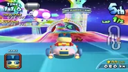 Mametchi racing in his Special Kart on the Rainbow Cup.