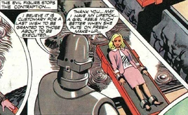 The evil figure stops the contraption