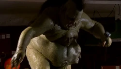 The Abzorbaloff stands atop his desk.