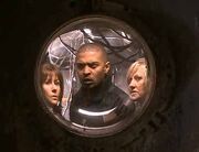 Mickey, Jackie and Sarah hide from the Daleks in a shot that demonstrates an effect nicknamed the " treatment".