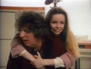 Romana, with the help of the , coaxes the Doctor into proposing marriage. (:  [+]Tom Baker, Prime Computer ads (1980)