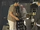 Crew members with Daleks and TARDIS L&K 1.png