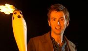 The Doctor lights the Olympic flame.