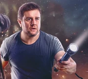 Rhys with a torch