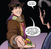 The Doctor offering jelly babies