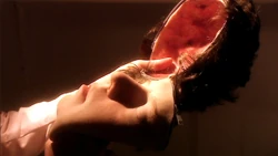 Oliver Charles' skin, discarded by the Slitheen