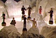 Model figurines of the Doctors and their companions in the Time Scoop's diorama.