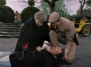 The Brigadier and the Doctor examine , the first victim of .