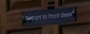 Report to front desk