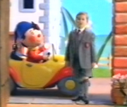 Boy exits Noddy's car