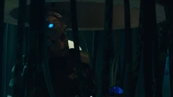 Seemingly asleep, Davros repears the Doctor's name.